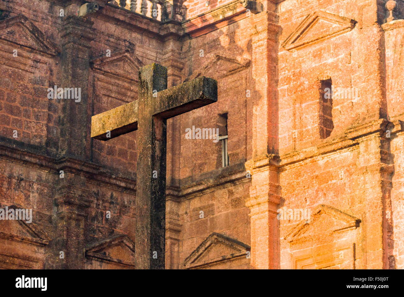 A stone cross at the entrance of the Basilika of Bom Jesus in Old Goa, one of the remaining big buildings built by the Portugues Stock Photo