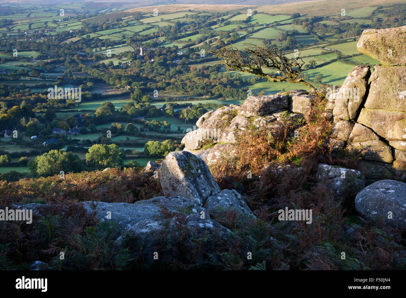 View from Chinkwell Tor down to Widecombe village on Dartmoor Stock Photo