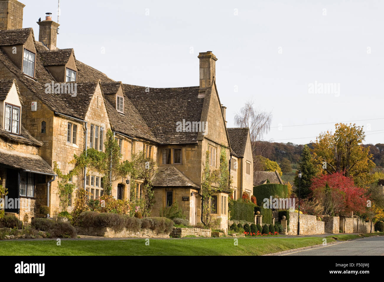 Cotswold stone houses in the Autumn sunshine. Stock Photo