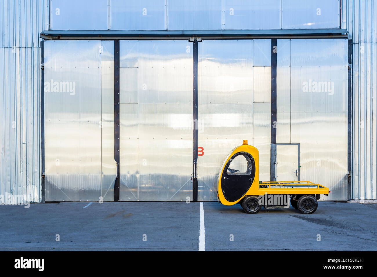 Electric car pickup truck with cargo platform Stock Photo - Alamy