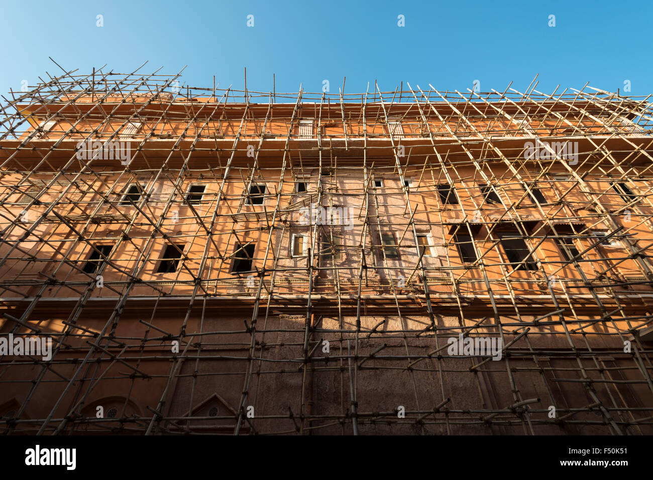 A bamboo scaffold for renovation of a building of the old walled Pink City Stock Photo