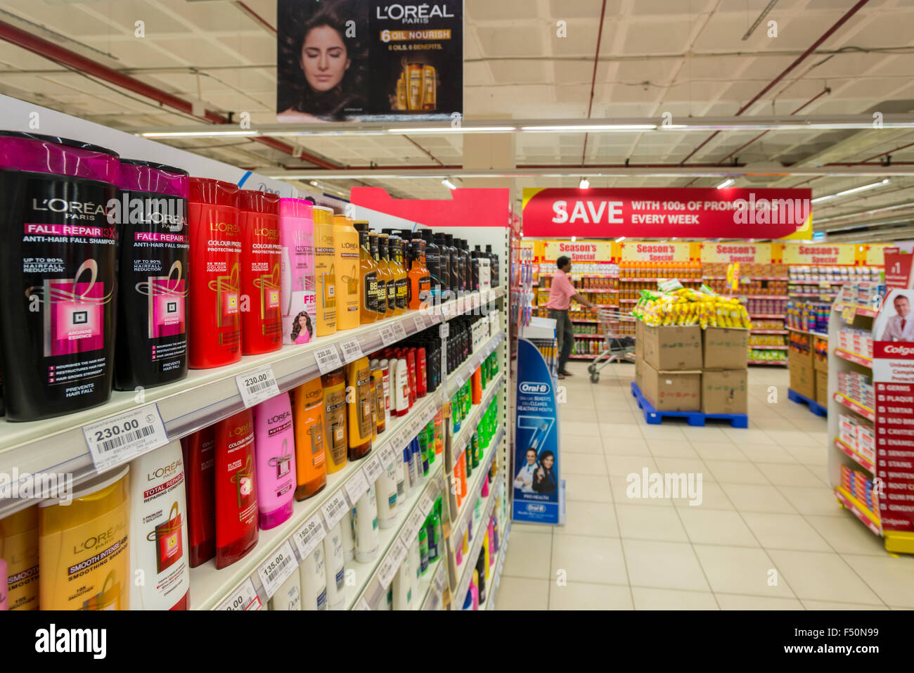 Different goods are for sale with discount in a big modern supermarket Stock Photo
