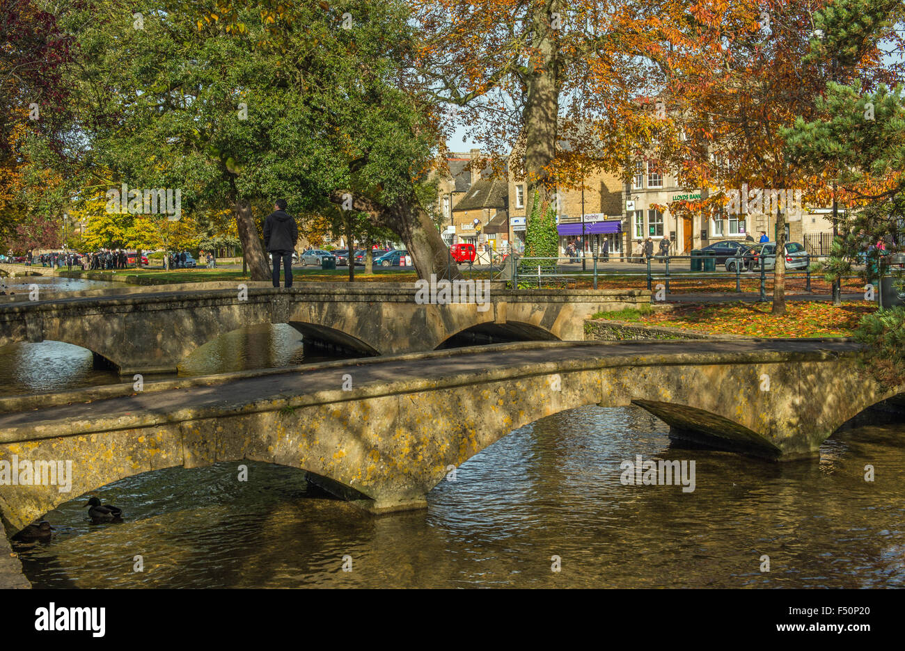 Bridges over the River Windrush at Bourton on the Water in the Cotswolds Gloucestershire Stock Photo