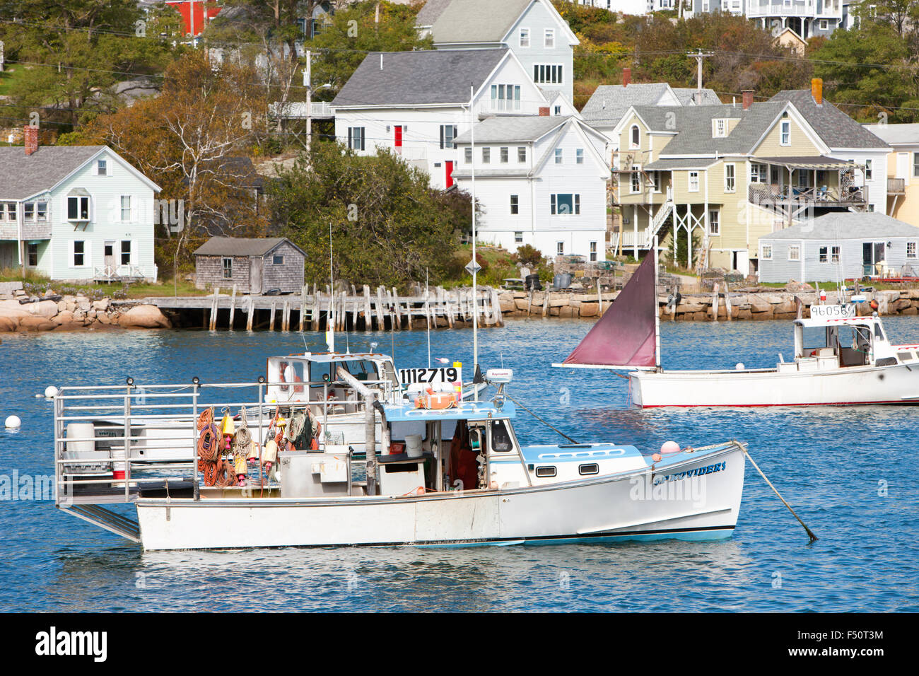 Lobster boats moored in Stonington Harbor in Stonington, Maine Stock