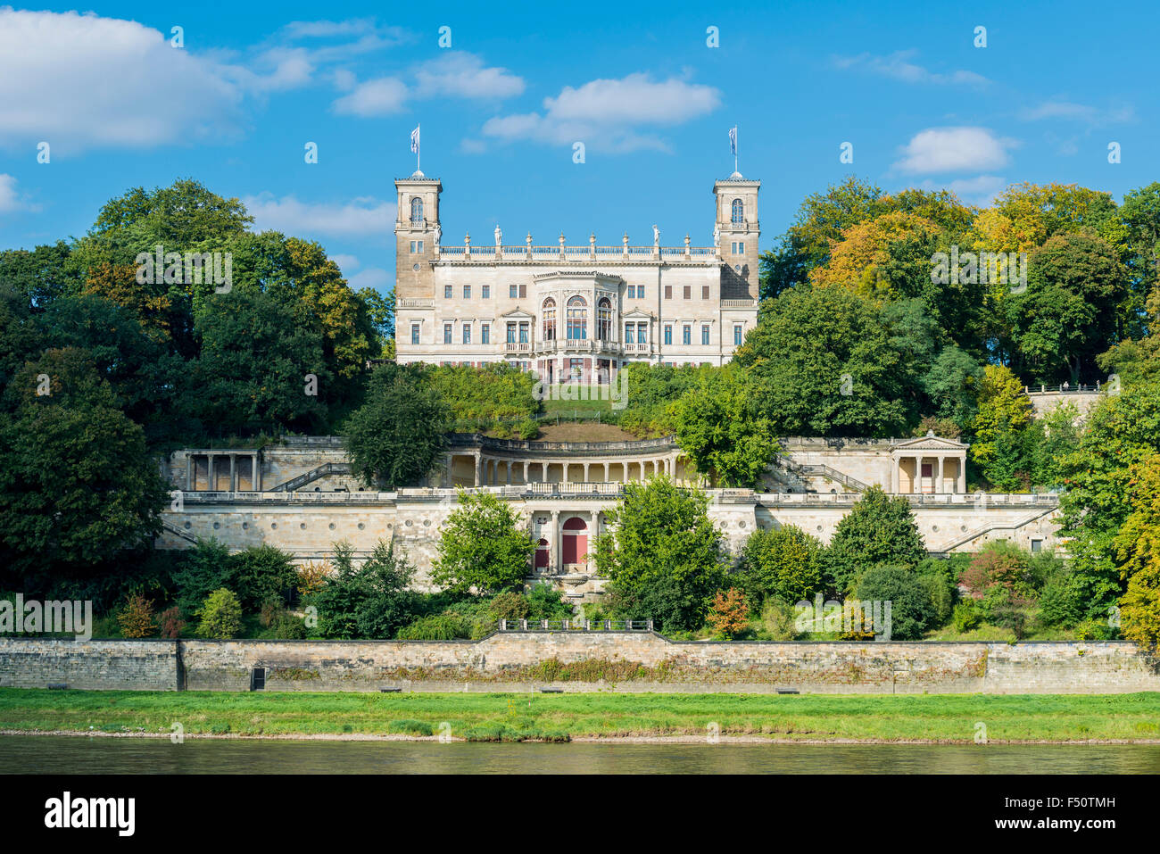 The castle Albrechtsberg is overlooking the valley Elbe, surrounded by trees Stock Photo