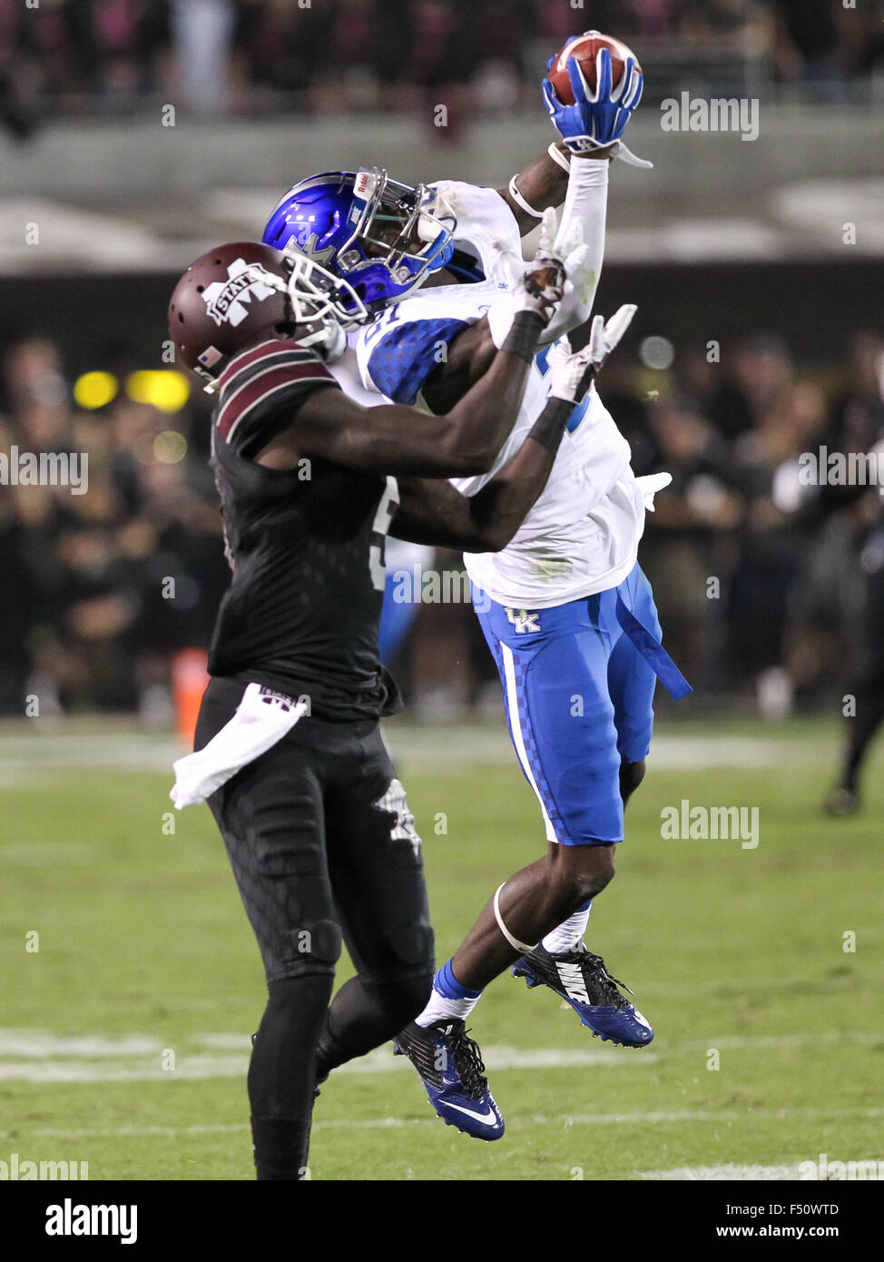 Starkville, MS, USA. 24th Oct, 2015. Kentucky Wildcats safety Mike Edwards (27) intercepts a pass over Mississippi State Bulldogs wide receiver Donald Gray (6) during the NCAA Football game between the Mississippi State Bulldogs and the Kentucky Wildcats at Davis Wade Stadium in Starkville, MS. Chuck Lick/CSM/Alamy Live News Stock Photo