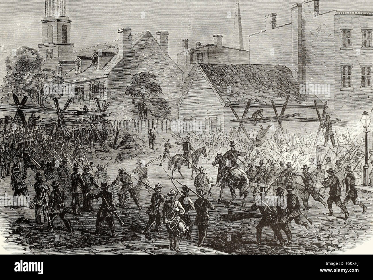 The Invasion of Maryland - Citizens of Baltimore barricading the streets, Monday Evening, June 29th, 1863. USA Civil War Stock Photo