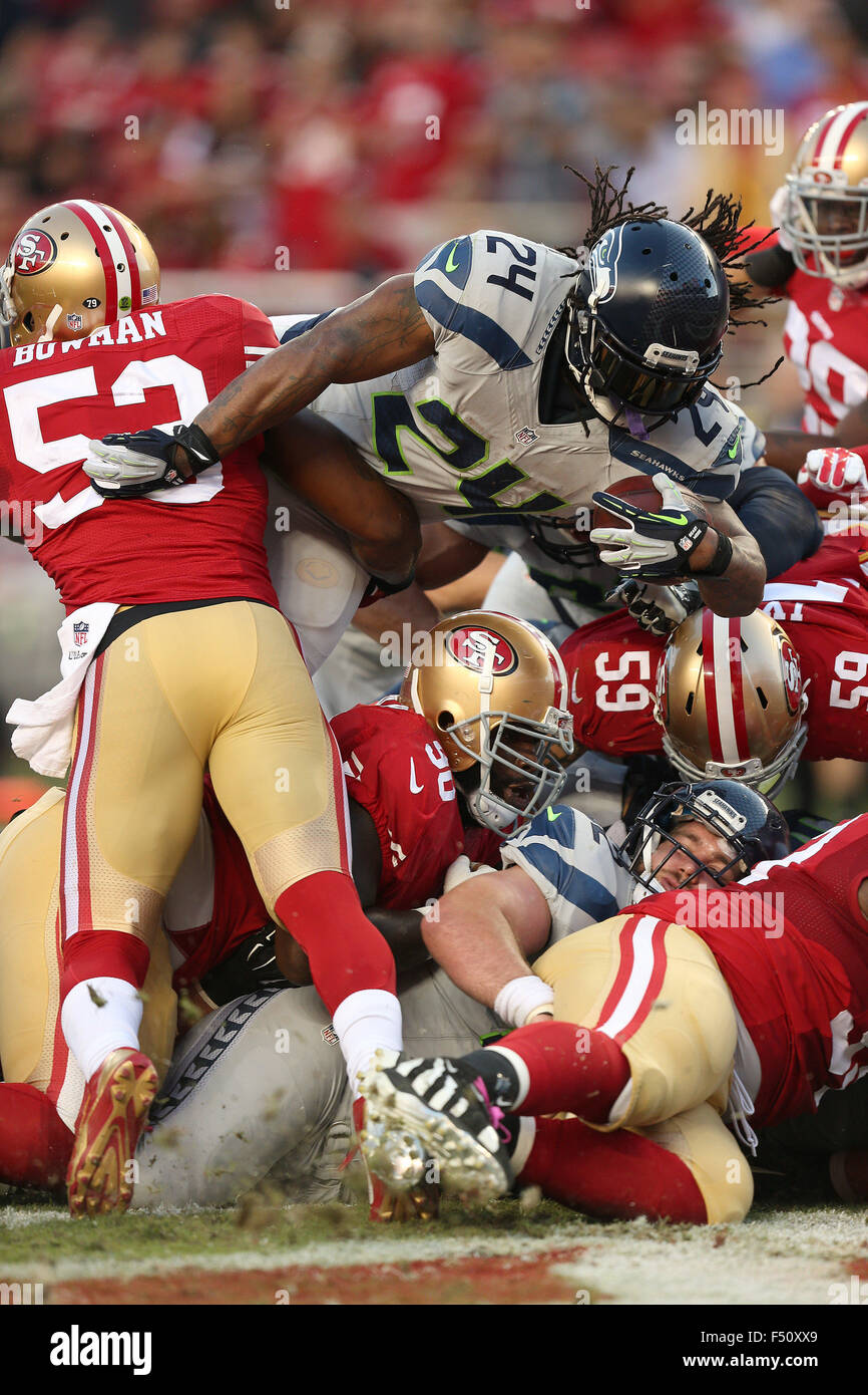 Santa Clara, CA. 22nd Oct, 2015. Seattle running back Marshawn Lynch goes over the top for the games first touchdown during action in an NFL game against the San Francisco 49ers at Levi's Stadium in Santa Clara, CA. The Seahawks won 20-3. Daniel Gluskoter/CSM/Alamy Live News Stock Photo