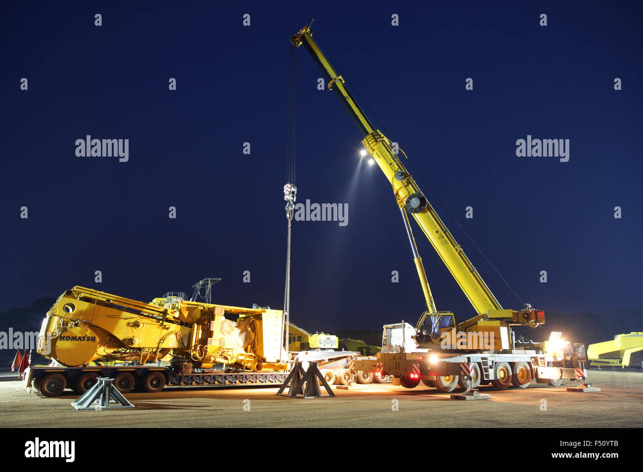 Night crane lift. FQM Copper mining operations in Zambia, Africa. Stock Photo