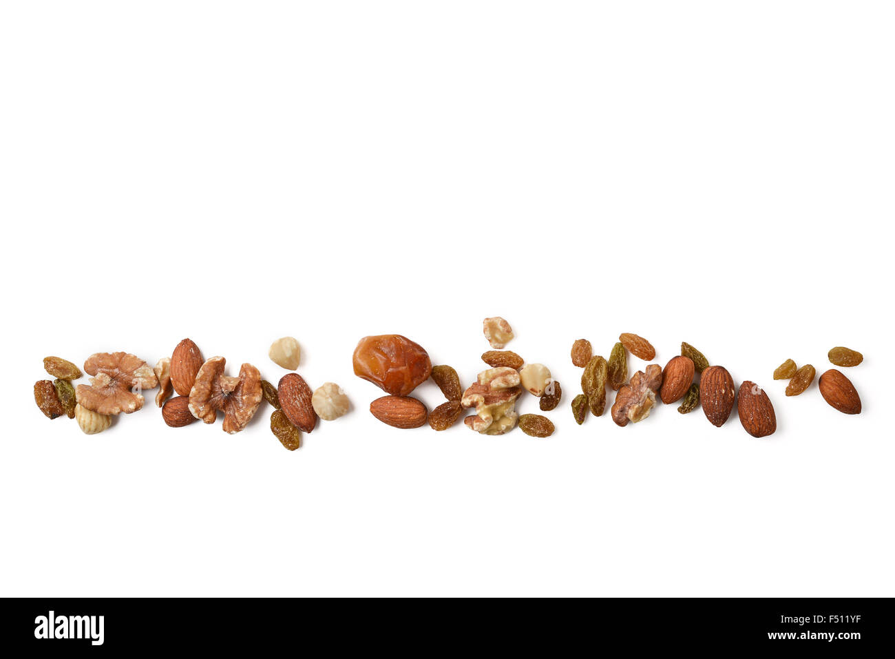 row of walnuts and grain Stock Photo Alamy