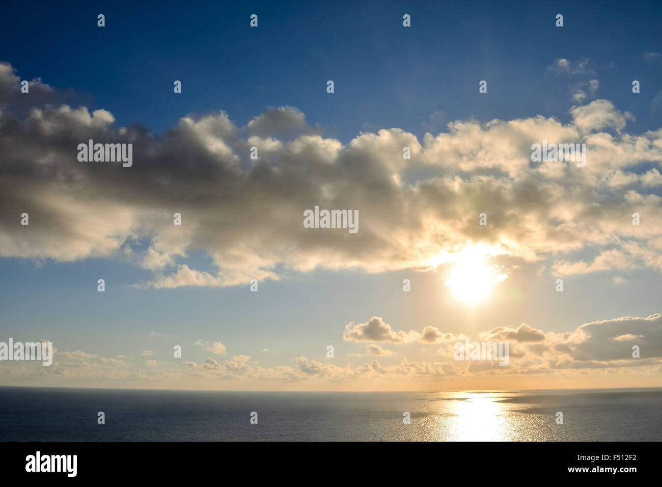Sea Setting Example The Sun Setting in the Sea Stock Photo - Alamy