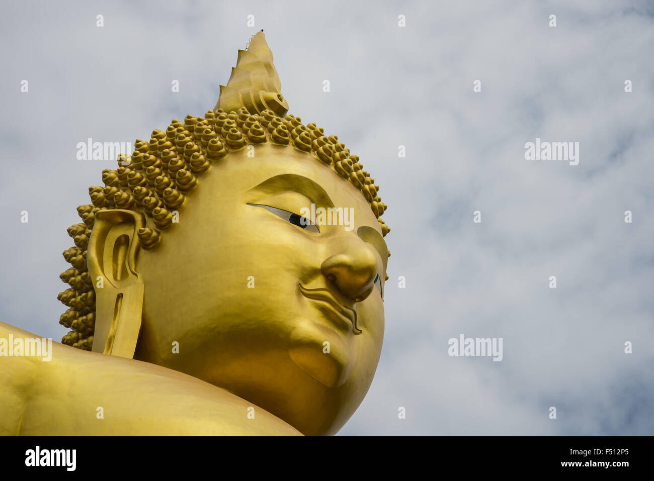 A big Buddha statue in the temple of Thailand Stock Photo - Alamy