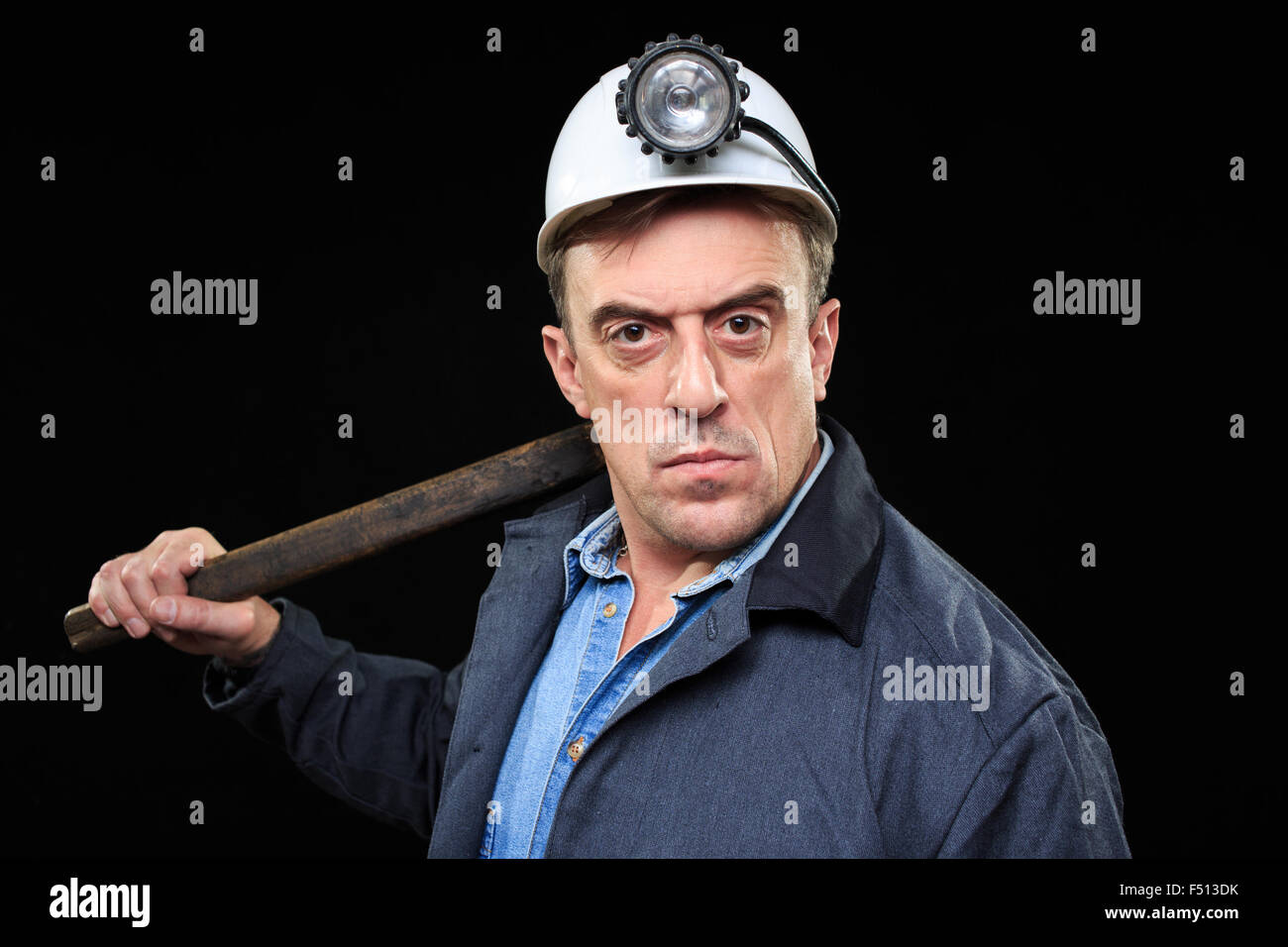 miner with a sledgehammer Stock Photo Alamy