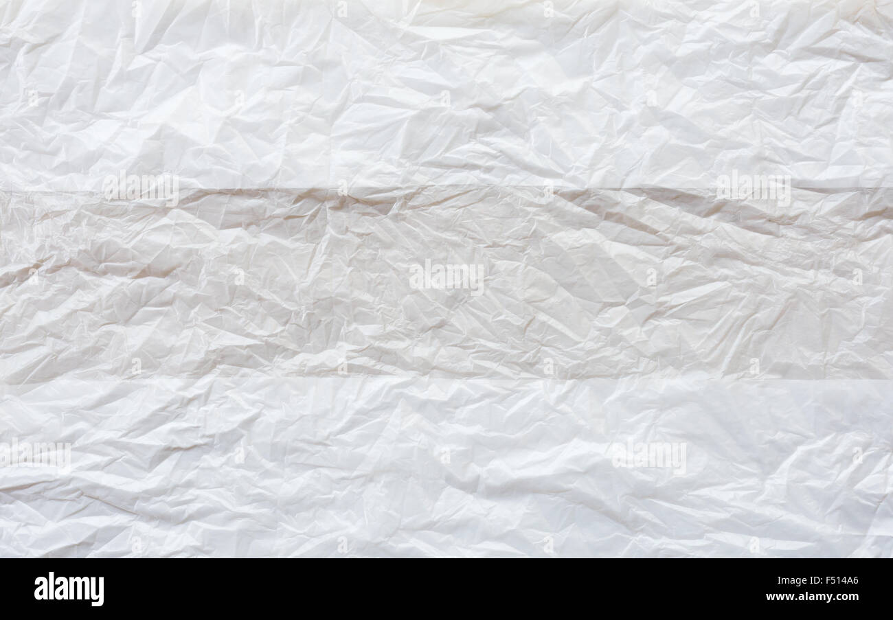 Crumpled white plastic bag for use in the house. Stock Photo