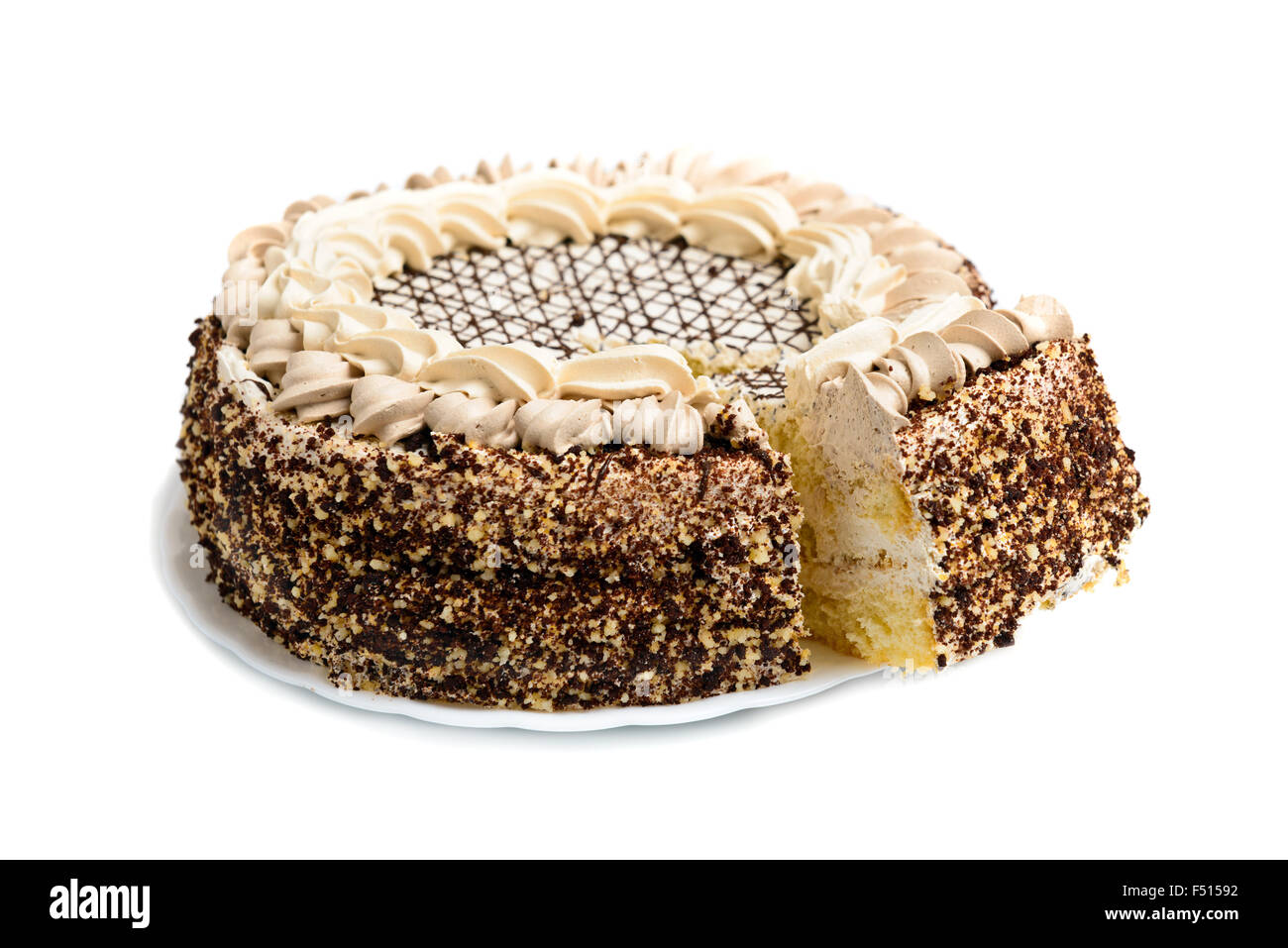 Chocolate cream cake on white background with slice Stock Photo - Alamy