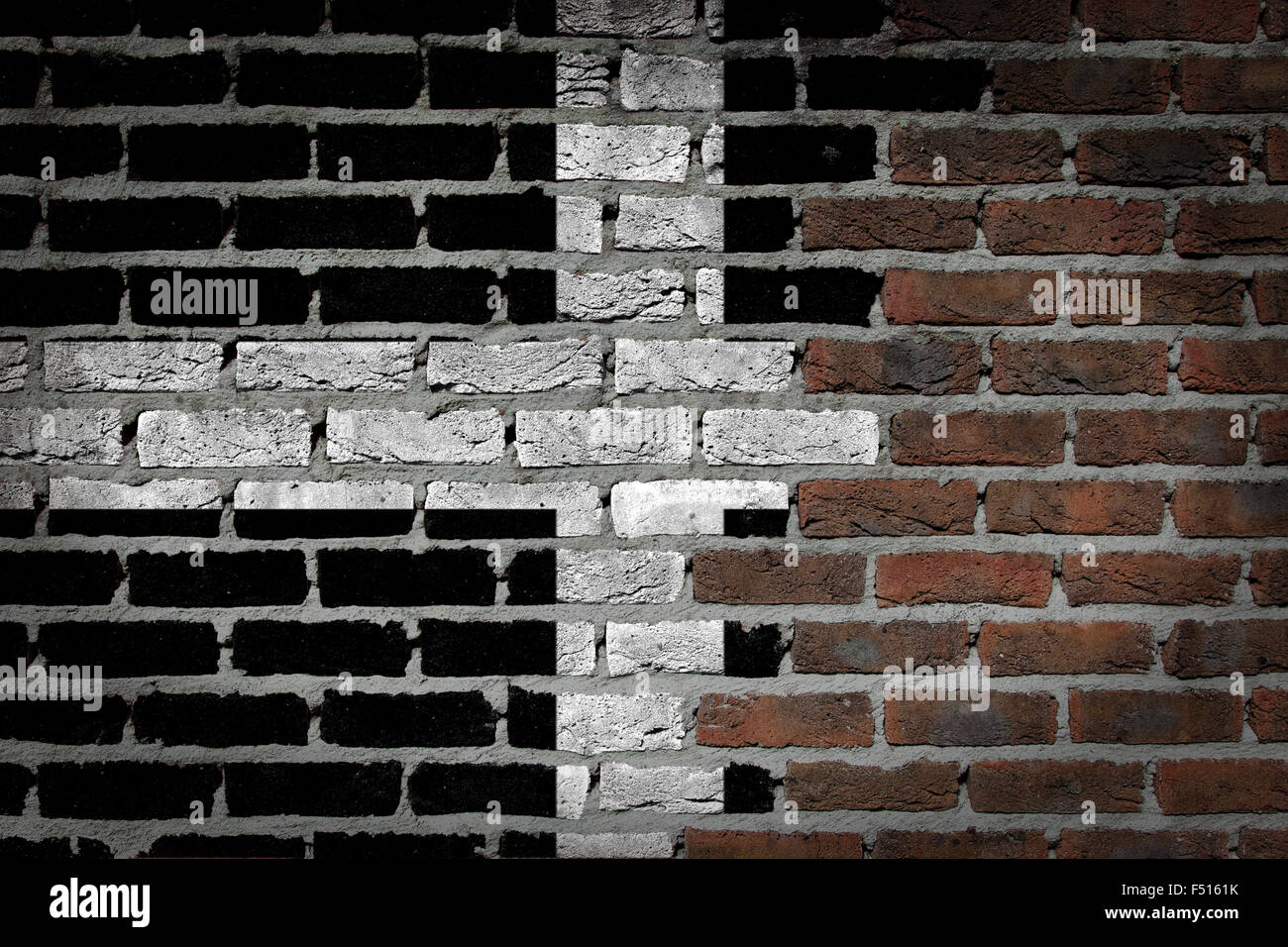 Dark brick wall texture - flag painted on wall - Cornwall Stock Photo ...