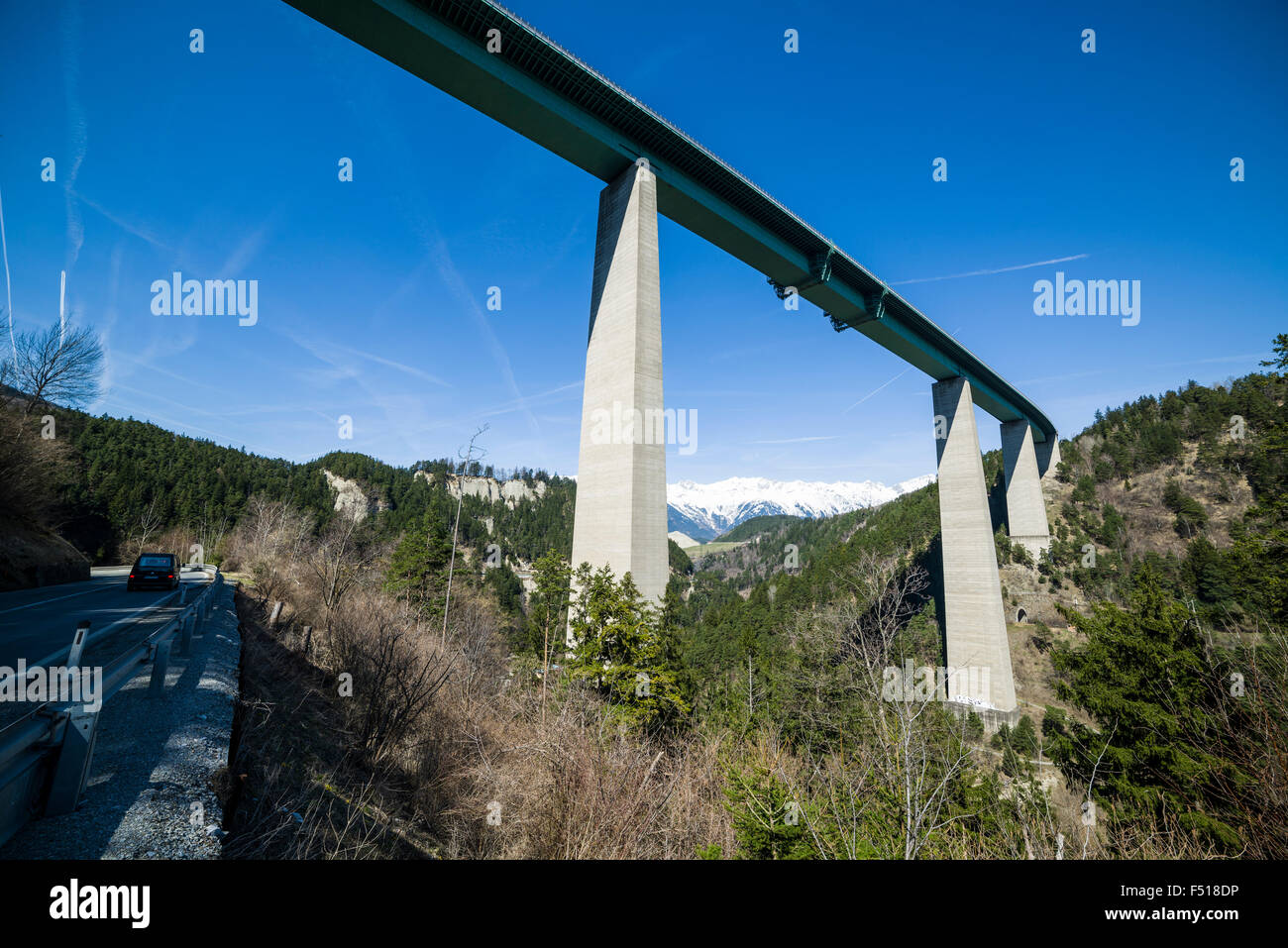 The bridge Europabrücke seen from the Brenner road, snow capped mountains in the distance Stock Photo