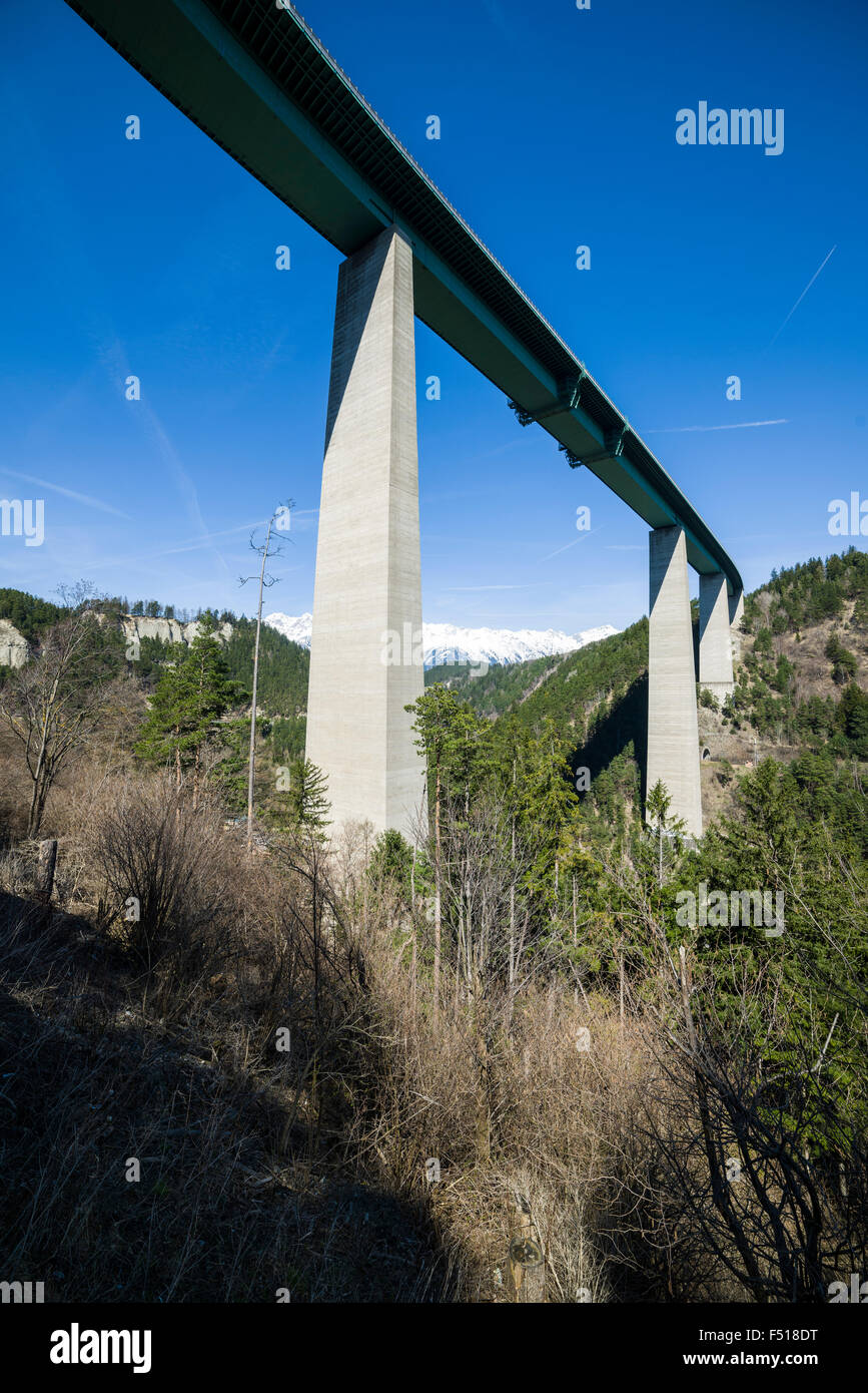 The bridge Europabrücke seen from the Brenner road, snow capped mountains in the distance Stock Photo