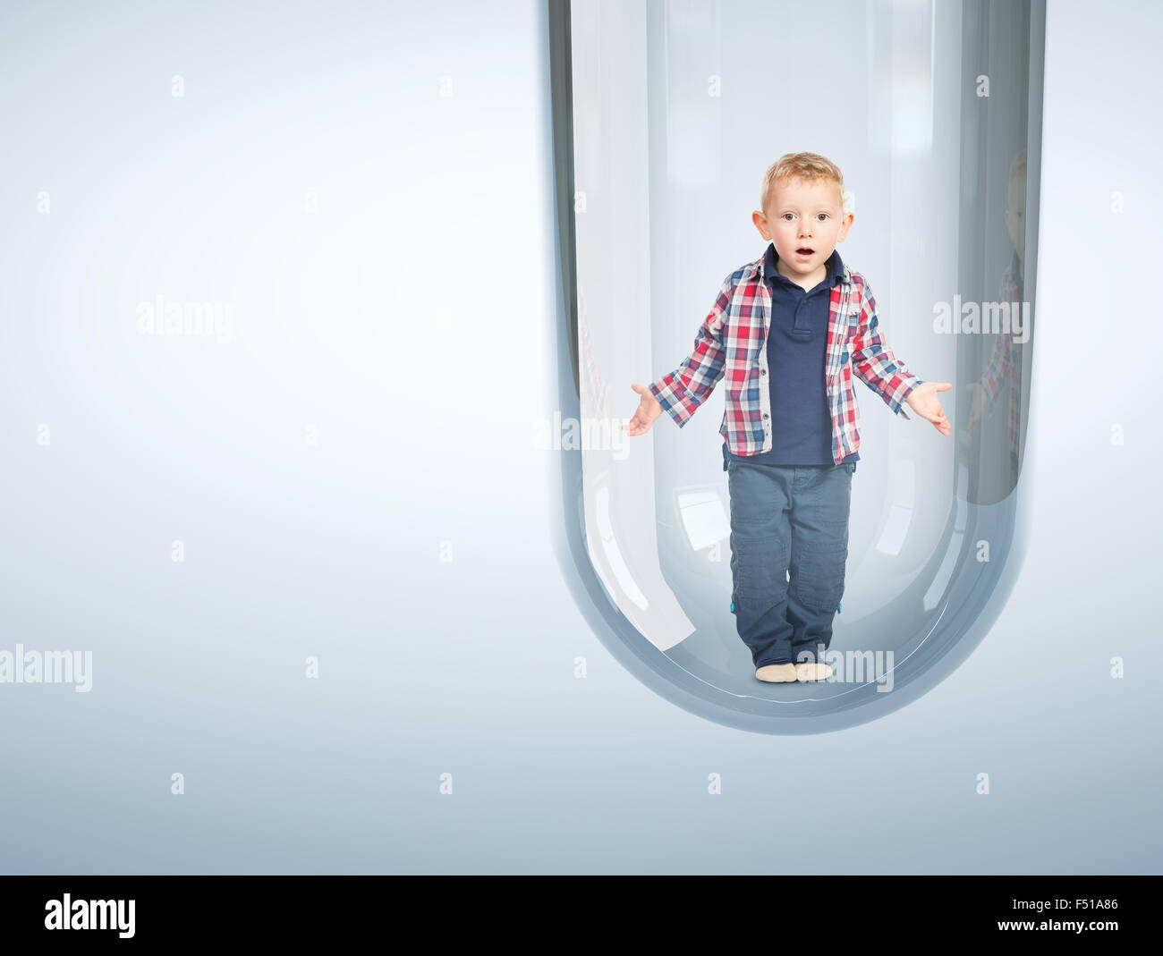 surprised child and tube vitro glass Stock Photo