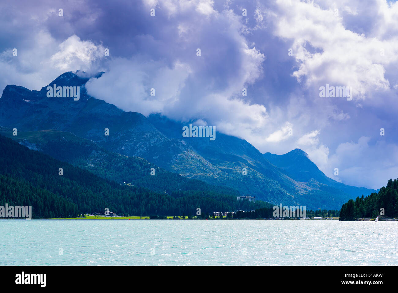 Lej da Silvaplana, a high altitude lake near St. Moritz, dark clouds at the sky Stock Photo