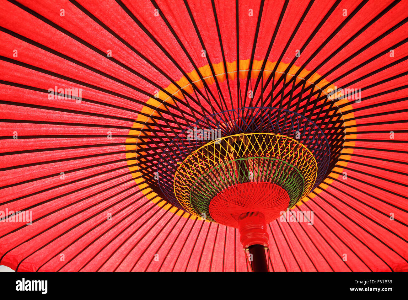 Design underneath the red Japanese umbrella Stock Photo Alamy