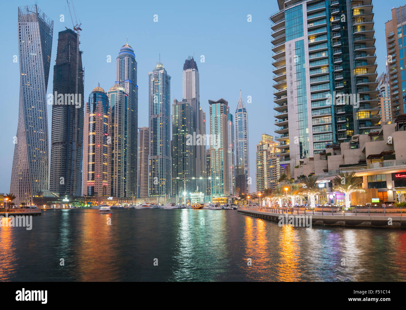 Skyline of skyscrapers  at night in  Marina district of Dubai United Arab Emirates Stock Photo
