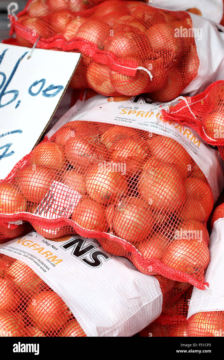 Fresh Onions in a bag for sale Stock Photo