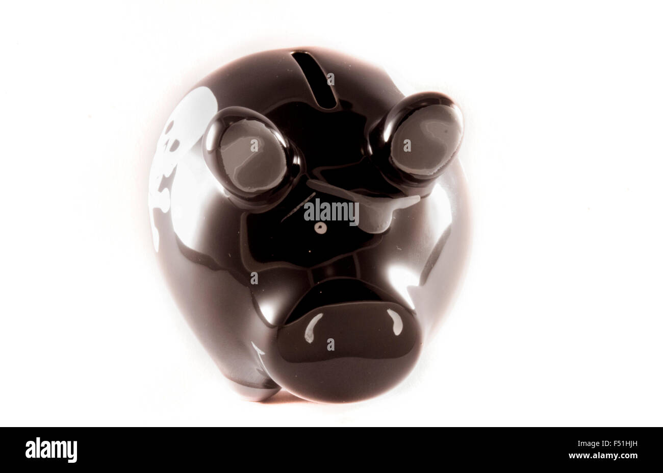 Black piggy bank on white hi-res stock photography and images - Alamy