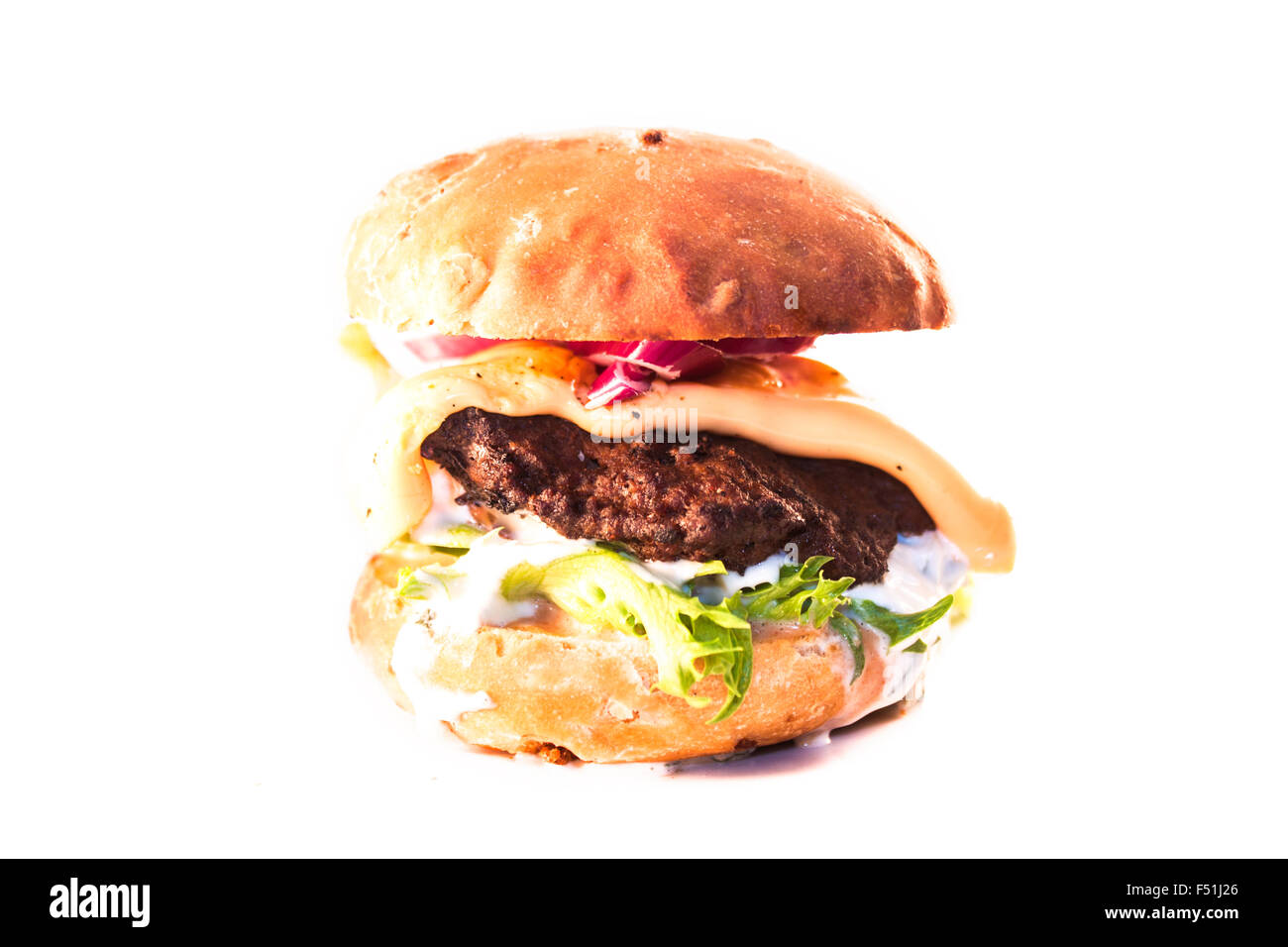 Homemade burger, made of minced beef, onion bun, lettuce, red onion and