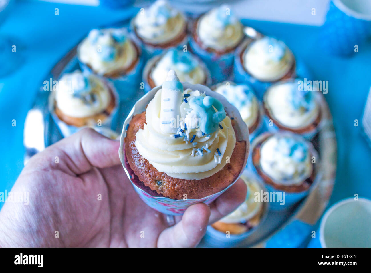 Pacifier And A Milk Bottle On A Baby Shower Cupcake Stock Photo Pacifier And A Milk Bottle On A Baby Shower Cupcake Stock Photo