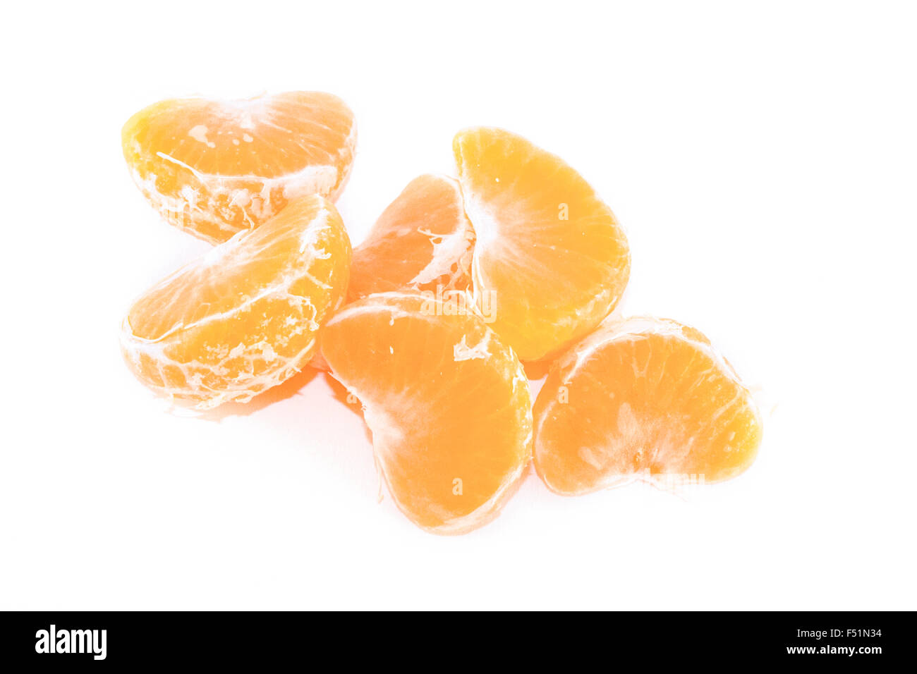 Orange mandarin sections, isolated on white background Stock Photo - Alamy