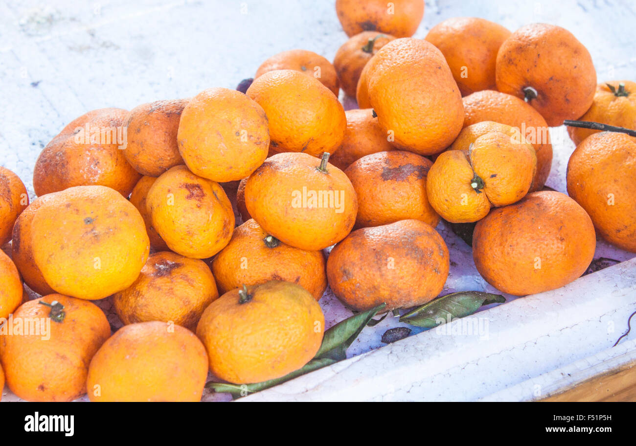 A lot of orange mandarins, Citrus unshiu, at a market, in phu quoc