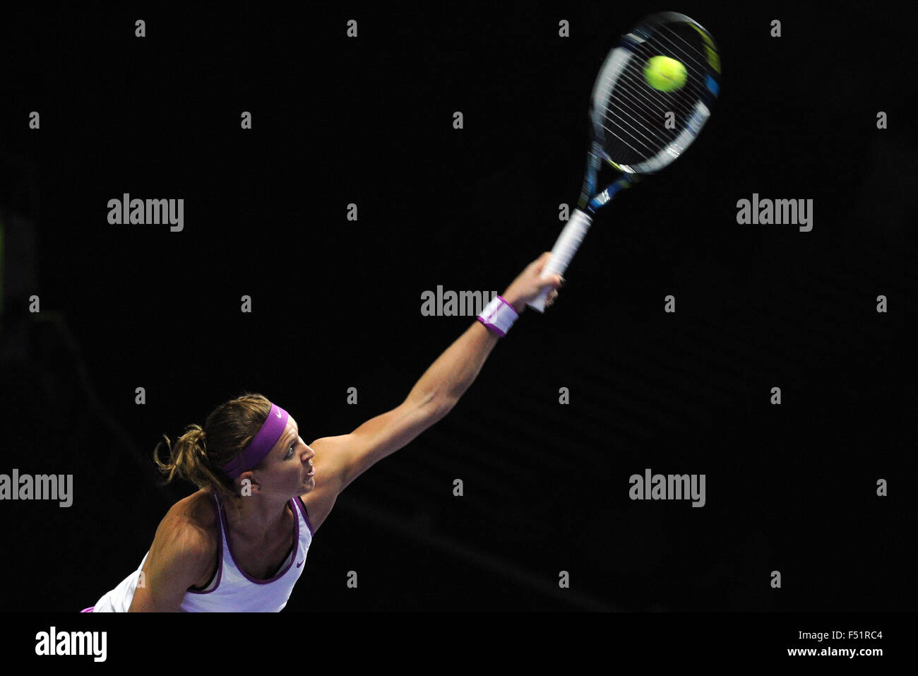 Singapore. 26th Oct, 2015. Lucie Safarova of the Czech Republic serves during the WTA Finals round robin match against Garbine Muguruza of Spain at Singapore Indoor Stadium in Singapore, Oct. 26, 2015. Lucie Safarova lost 0-2. Credit:  Then Chih Wey/Xinhua/Alamy Live News Stock Photo