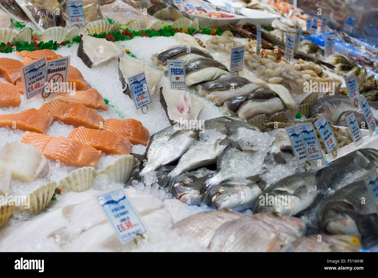 Fresh fish on a fishmongers stall in Leeds Kirkgate Market in West