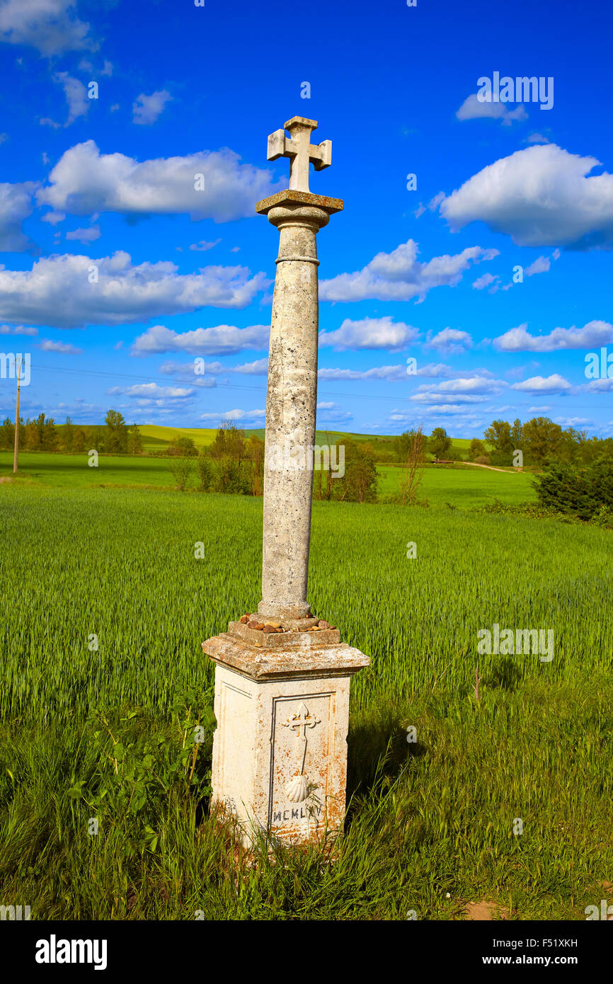 The Way of Saint James cross column in Palencia cereal fields of Spain