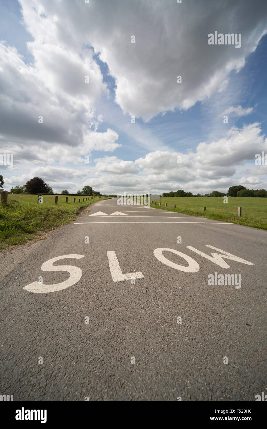 Slow, warning drivers of ramp ahead Stock Photo - Alamy