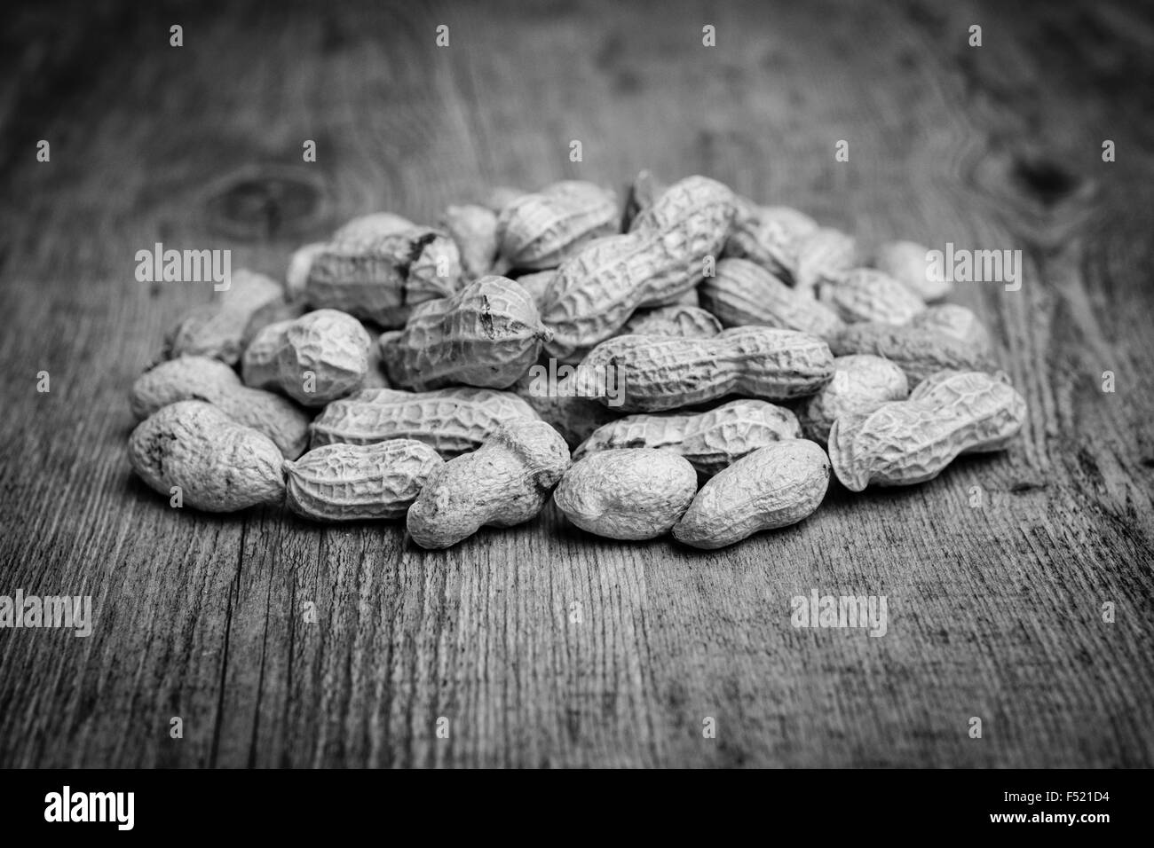 Roasted monkey nuts in shells, black & white Stock Photo