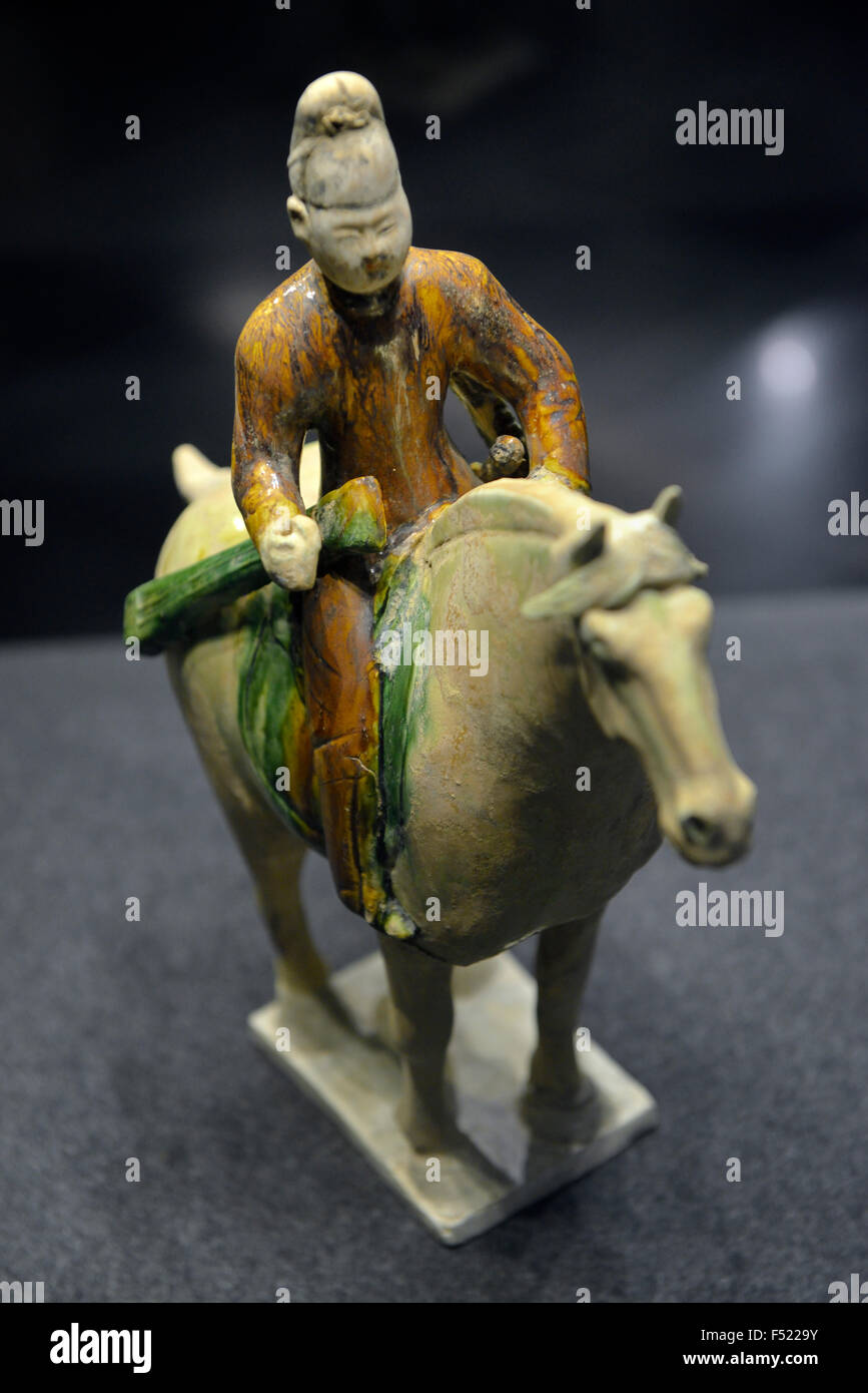 Tri-colored Pottery Hunter on Horse Back. Shanxi Museum in Xi'an, China. Stock Photo