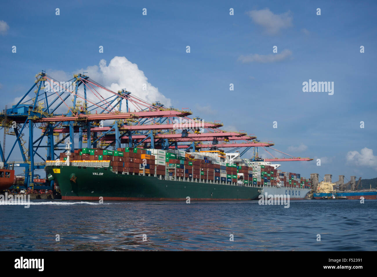 Cargo container vessel been loaded/offloaded at Santos port, São Paulo, Brazil Stock Photo