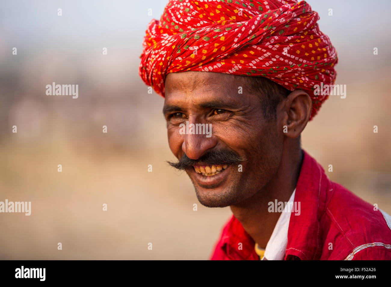 moustached man from Rajasthan with red headscarf, Pushkar, Stock Photo