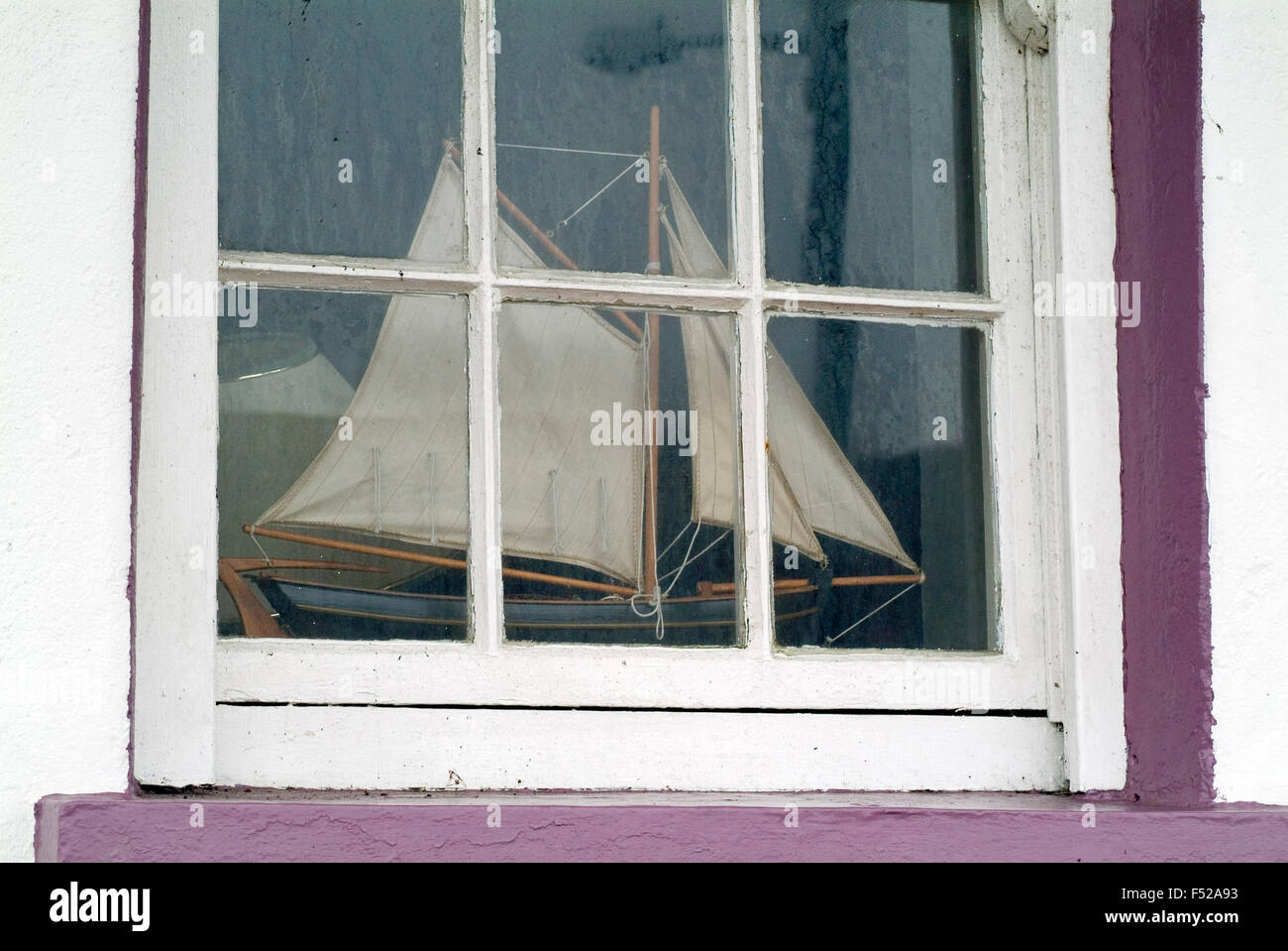 Window with sail ship in Dunmore Waterford Irland Europe Stock Photo