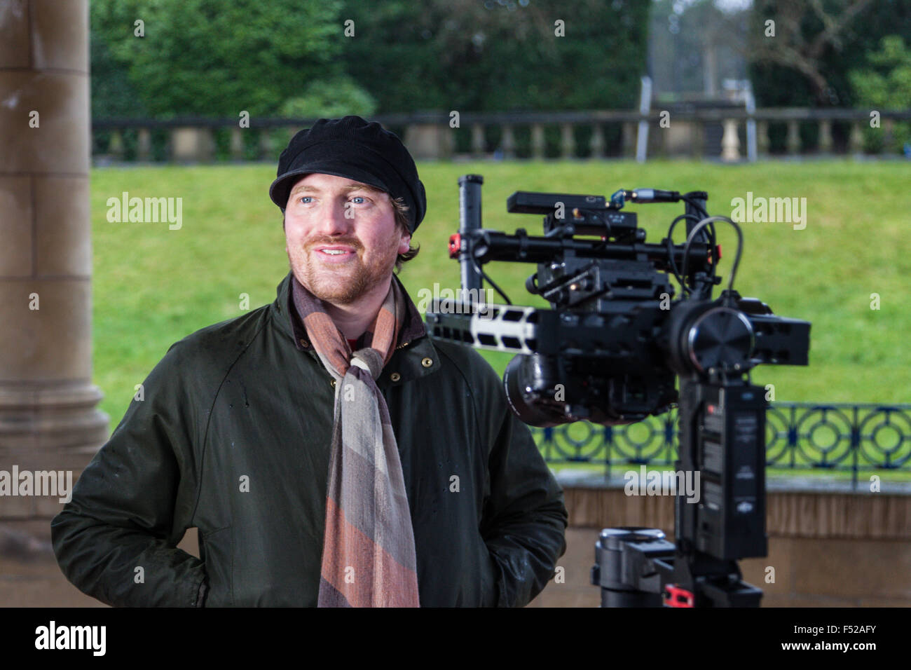 Matthew Milnes, band member of Bradford band Kascarade, shot during filming of music video, Lister Park, Bradford Stock Photo