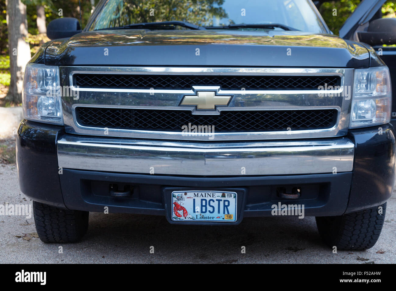 An american truck with a lobster-related number plate, Maine, New England, USA Stock Photo