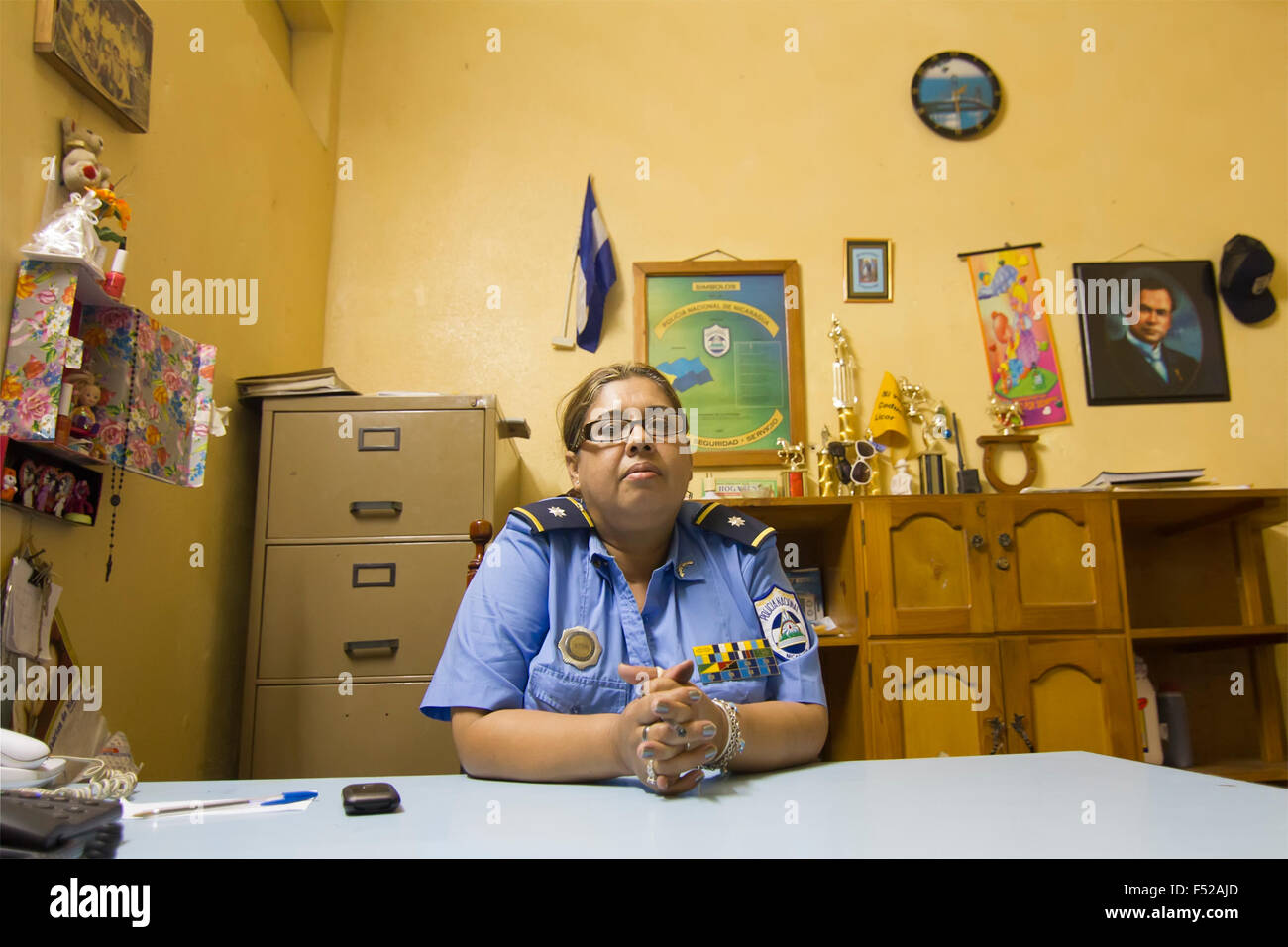 Esteli, Nicaragua - November 8, 2011: Nicaraguan female police officer in her office Stock Photo