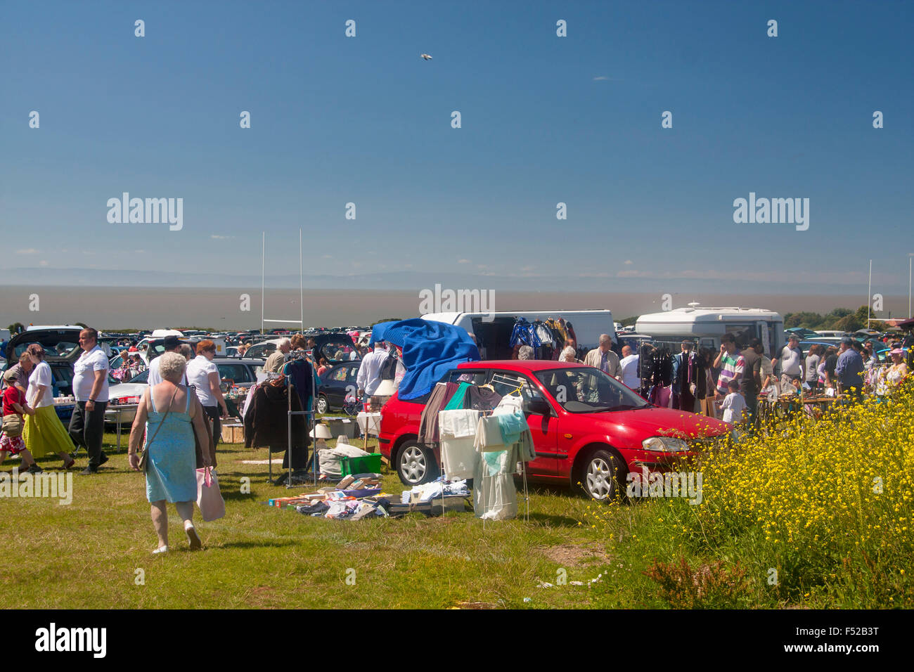 Car boot sale in field overlooking Bristol Channel sea coast Sully Vale