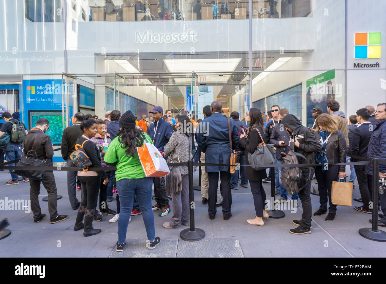 New York, USA. 26th October, 2015. Shoppers wait to enter the Microsoft