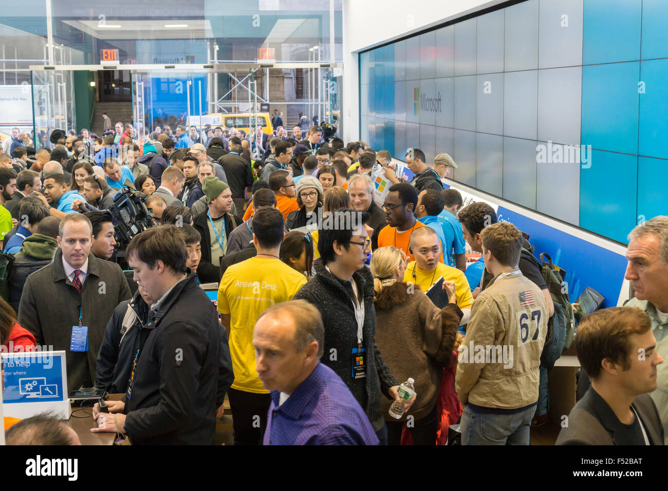 New York, USA. 26th October, 2015. Shoppers crowd the Microsoft flagship store on Fifth Avenue in New York at its grand opening, Monday, October 26, 2015. Visitors browsed Surface laptops, Xboxes and other products from Microsoft and other manufacturers. This is the 113th Microsoft store , it's largest at 22,000 square feet and the only one of two that is not situated in a mall. Credit:  Richard Levine/Alamy Live News Stock Photo