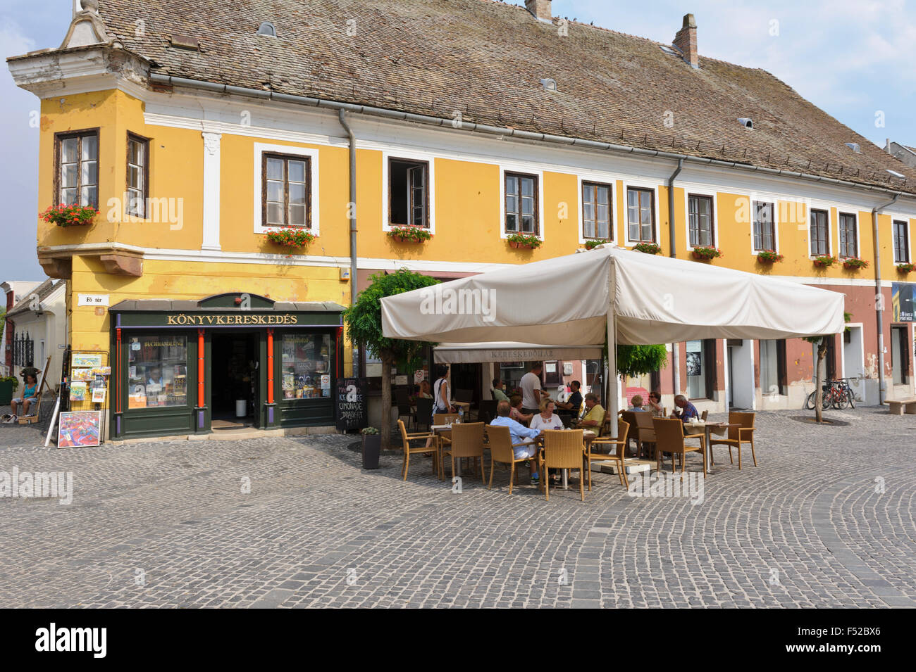 Tourists sitting outside a restaurant in the small village of Szentendre, Hungary. Stock Photo