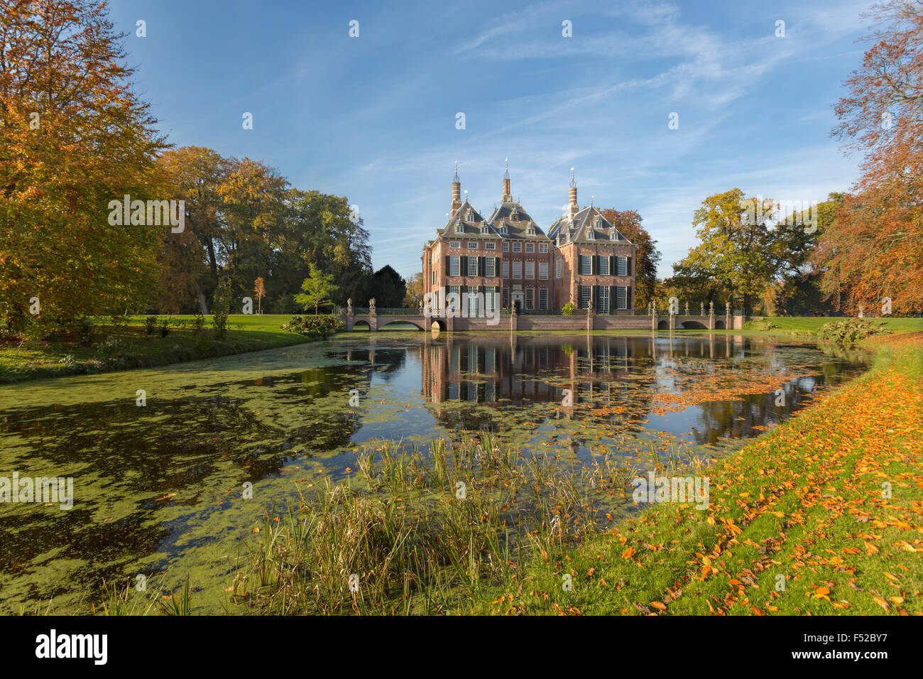 Fall colors at Duivenvoorde Castle, Voorschoten, South Holland, The Netherlands. Build in 1631 with an English landscape park. Stock Photo