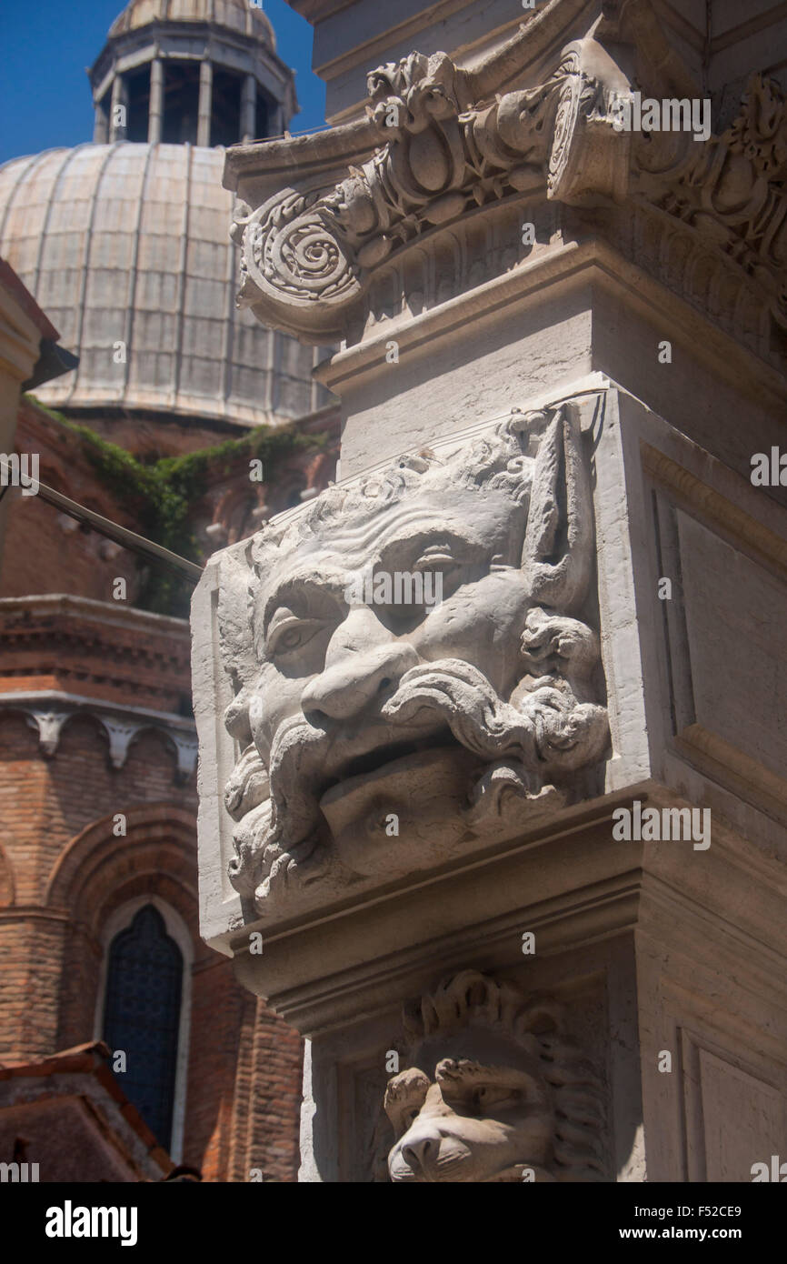 Grotesque stone carving on exterior of Ospedaletto or Santa Maria dei Derelitti church Venice Veneto Italy Stock Photo
